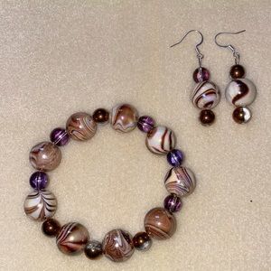 Handmade glass bead bracelet with matching earrings. It comes as a set.